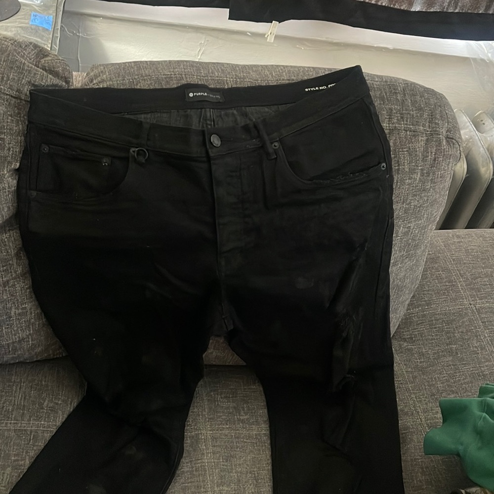 Black Oil spilled purple jeans